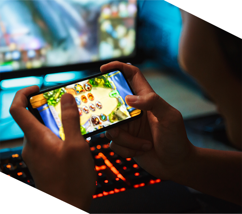 person playing mobile game on smartphone